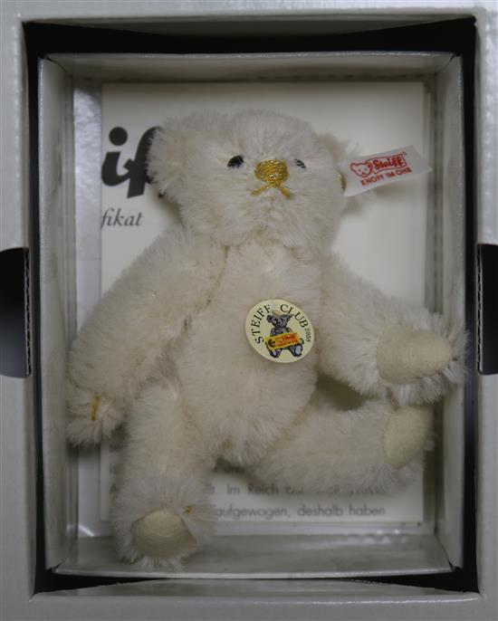 Twelve Club bears, some boxed with tags